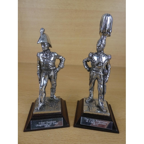 27 - A pair of Royal Hampshire metal military figures.