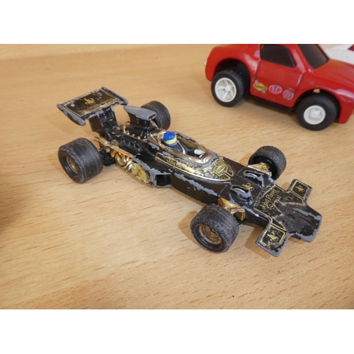 39 - A vintage Corgi whizzwheels 'John Player Special F1', Matchbox Rolamatrix army tank and lots more.