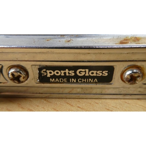 44 - A vintage 'Sports Glass' cased opera glasses.