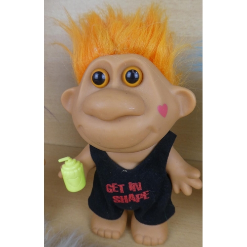 47 - A collection of vintage troll dolls.