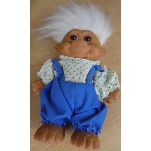 47 - A collection of vintage troll dolls.