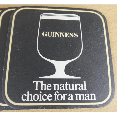 52 - A lot of vintage 'Guinness - The Natural Choice for a Man' beer mats.