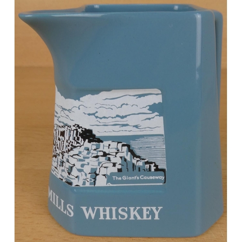 59 - A vintage Wade Old Bushmills Whiskey 'Causeway' pub jug.