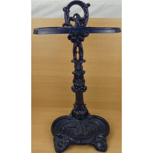 6 - An antique cast iron stick stand.