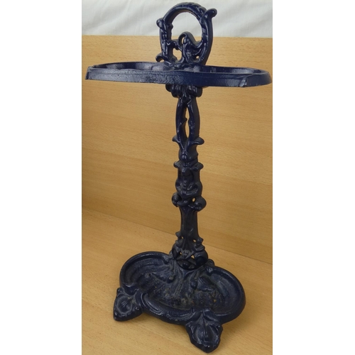 6 - An antique cast iron stick stand.