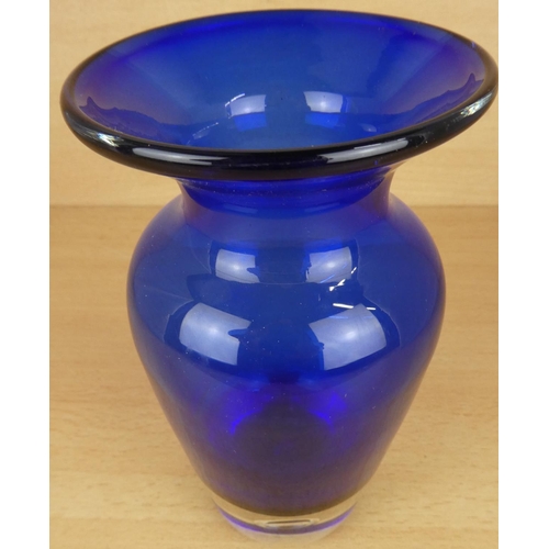 60 - A vintage heavy based Bristol blue vase.