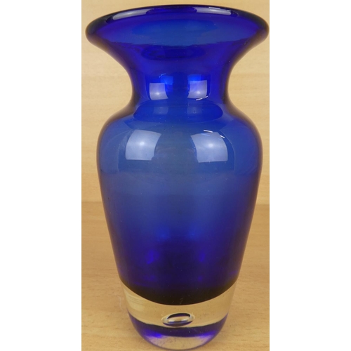 60 - A vintage heavy based Bristol blue vase.