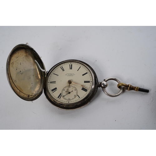 553 - An antique pocket watch 'Donegan, 32 Dame Street, Dublin' and key, and another (a/f). in sterling si... 