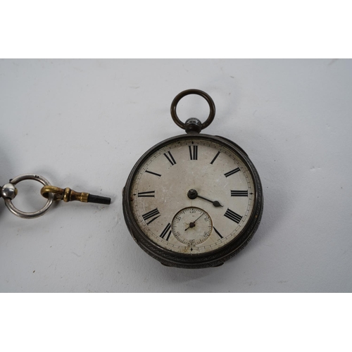 553 - An antique pocket watch 'Donegan, 32 Dame Street, Dublin' and key, and another (a/f). in sterling si... 