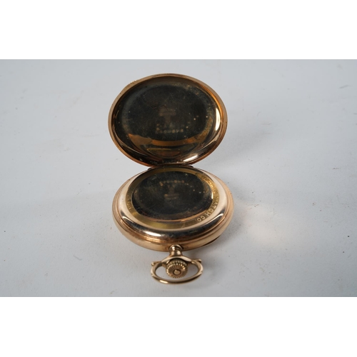 554 - An antique gold plated 'Howard' pocket watch (a/f).