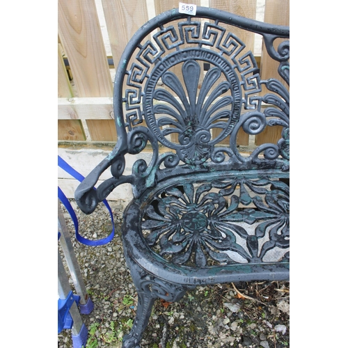 559 - A decorative cast metal garden bench.