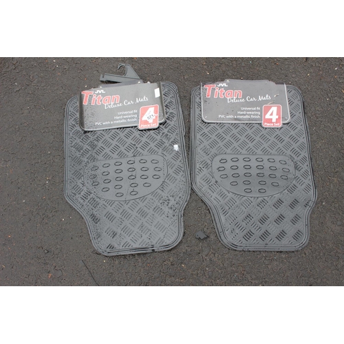 571 - Two new sets of universal car mats.