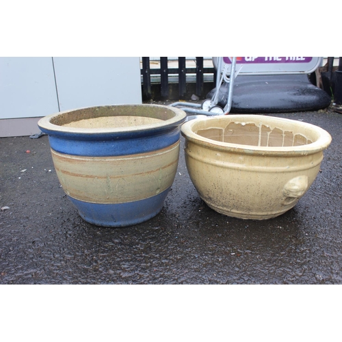 576 - Two glazed plant pots.