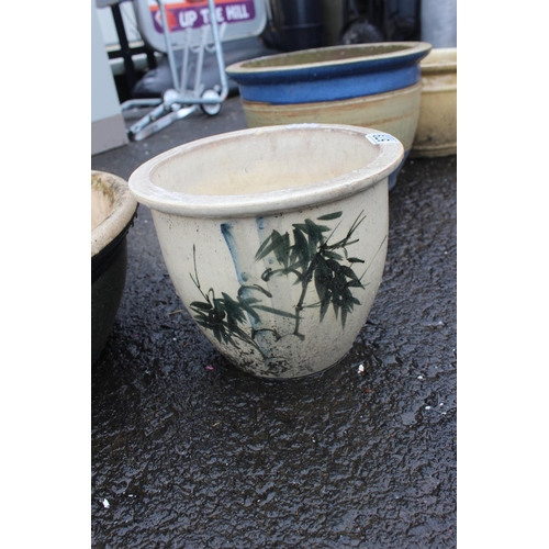 579 - Two glazed plant pots.