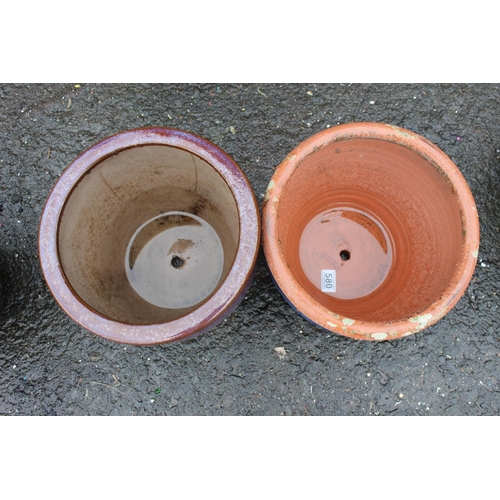 580 - Two glazed plant pots.