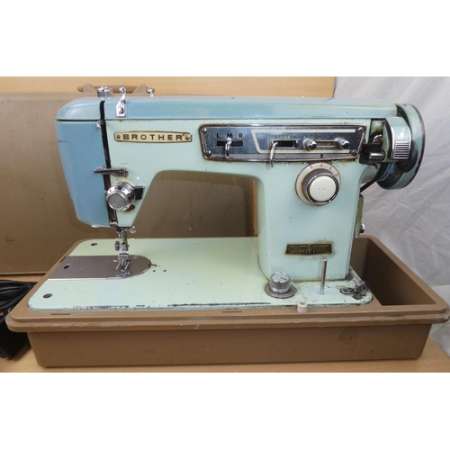 1 - A vintage cased Brother sewing machine.