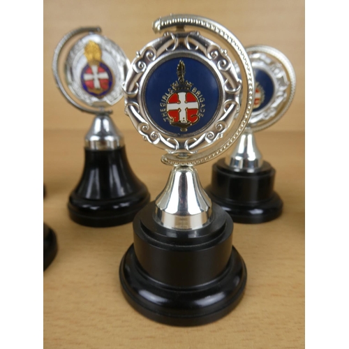 128 - A collection of Girls Brigade presentation cups.