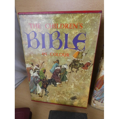 183 - A collection of antique bibles and more.