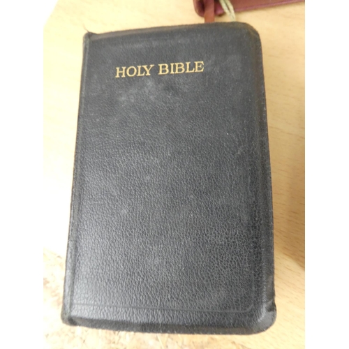 183 - A collection of antique bibles and more.