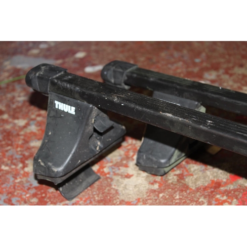 250 - A pair of Thule car roof brackets.