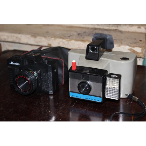 261 - A vintage Polaroid Swinger II Land Camera and a cased Mazim vintage camera.