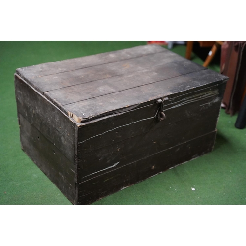 275 - An antique wood trunk.