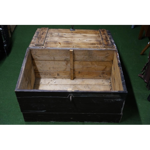 275 - An antique wood trunk.