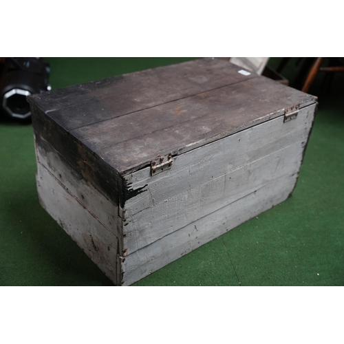 275 - An antique wood trunk.