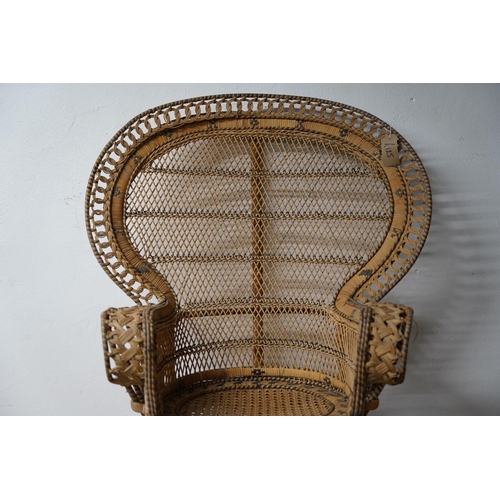 288 - A stunning vintage rattan peacock style armchair.