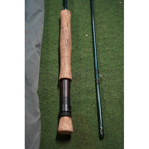 A cased Greys Greyflex 10ft 7/8 two piece fishing rod.