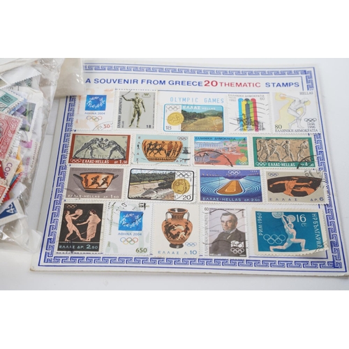 394 - A lot of various World postage stamps and a Greece Souvenir card.