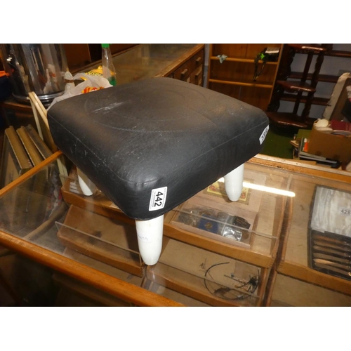 442 - A vintage faux leather stool with circular pattern.