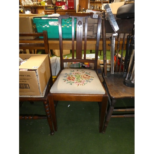 475 - A vintage mahogany chair with carved panel and tapestry seat.