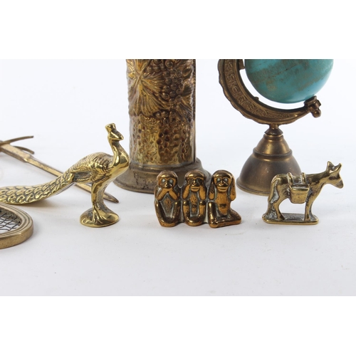 23 - An assortment of brassware items and figures.