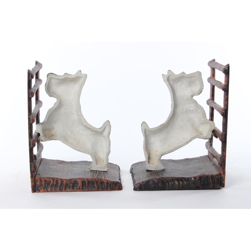 37 - A pair of cast metal bookends, modelled as dogs.