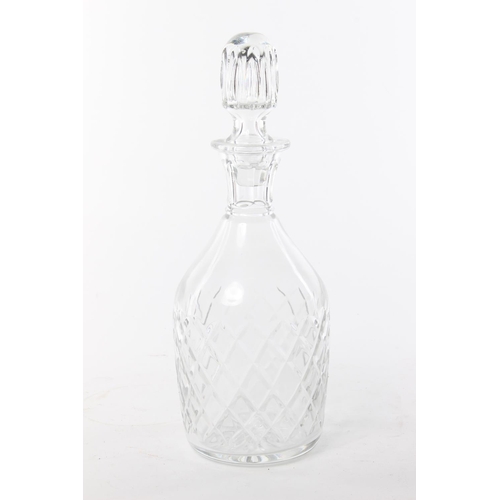 55 - A vintage cut glass decanter. Approx  29cm.