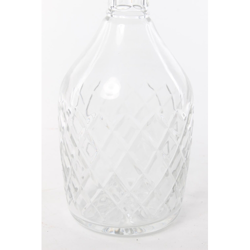 55 - A vintage cut glass decanter. Approx  29cm.