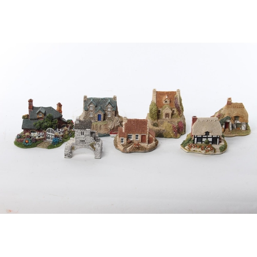 63 - An assortment of model houses by Lilliput Lane and Fraser Creations.