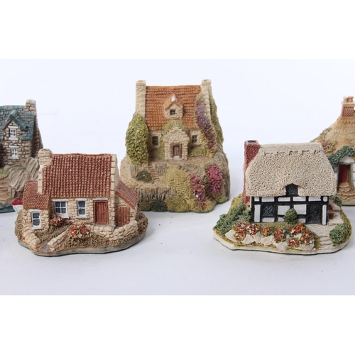 63 - An assortment of model houses by Lilliput Lane and Fraser Creations.