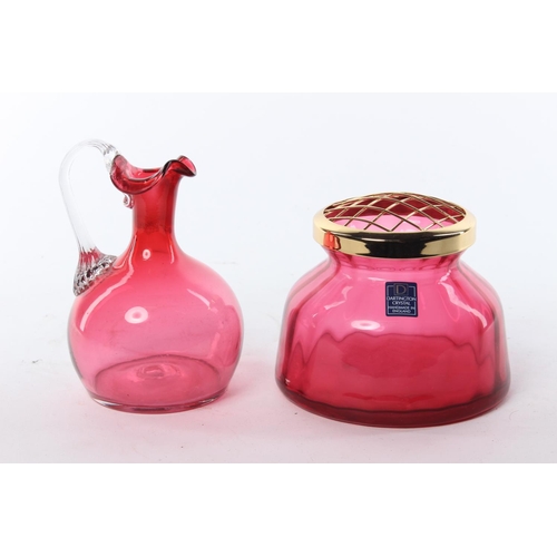 74 - A ruby glass jug and a ruby glass Dartington vase.