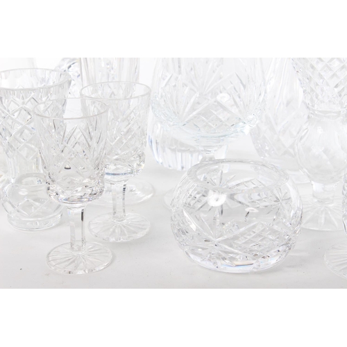 75 - A large assortment of cut glass and crystal ware.