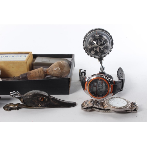 81 - An assortment of items to include seashells, watches, ceramics and more.