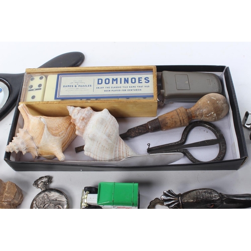 81 - An assortment of items to include seashells, watches, ceramics and more.