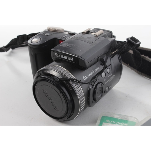 97 - A Fujifilm FinePix 6900Zoom digital camera.