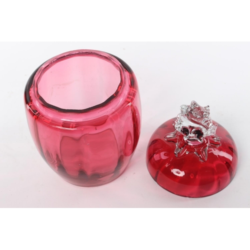 98 - A Victorian handblown ruby glass lidded pot.