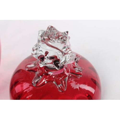 98 - A Victorian handblown ruby glass lidded pot.