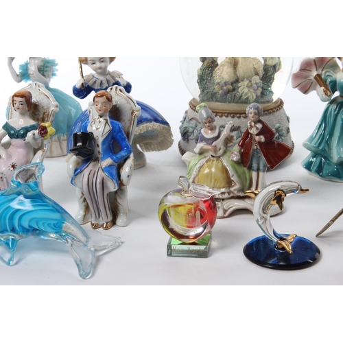 101 - An assortment of items to include antique ceramics ladies, glassware and more.