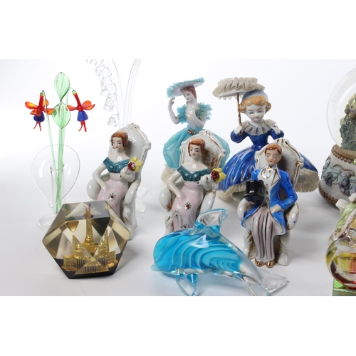 101 - An assortment of items to include antique ceramics ladies, glassware and more.