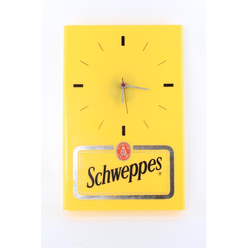 103 - A vintage Schweppes advertisement bar clock.