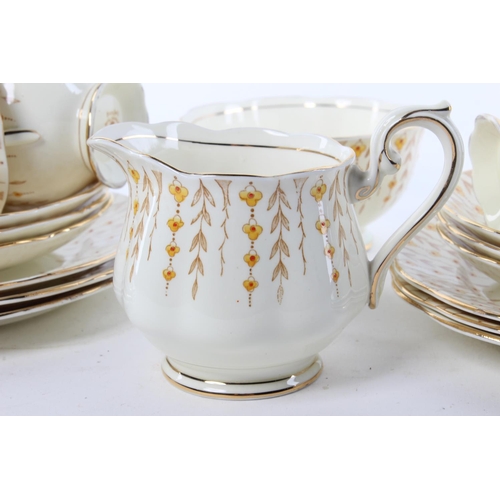 104 - An antique hand painted Royal Albert Crown China tea set, to include a milk jug, sugar bowl, teacups... 